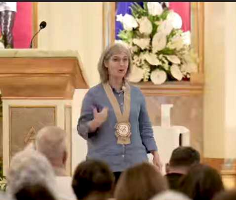 4 Gift giving of booklet for the Cause of Sr. Lucia\'s Great Vision of the Holy Trinity Booklet